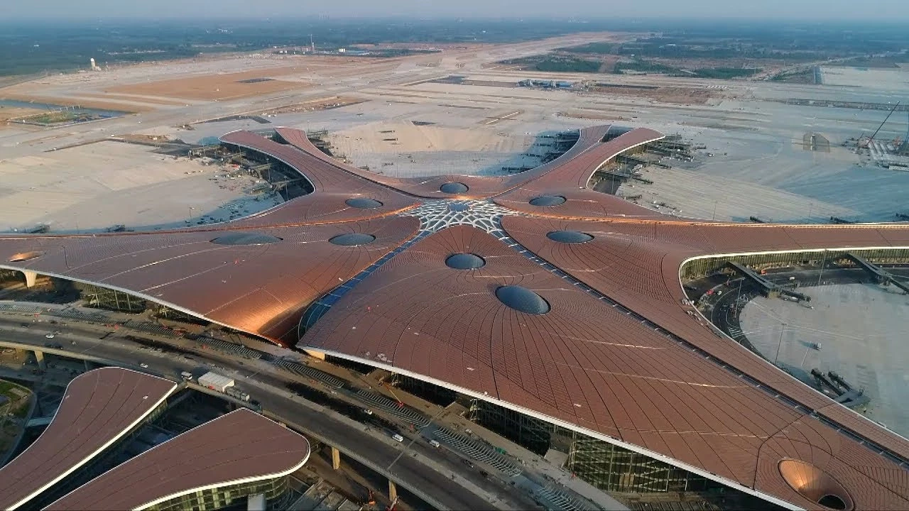 Beijing's new mega airport is nearing completion and is slated to open for business in September. The airport, set to be one of the world's largest aviation hubs, was designed by Zaha Hadid Architects to accommodate a whopping 120 million passengers a year.