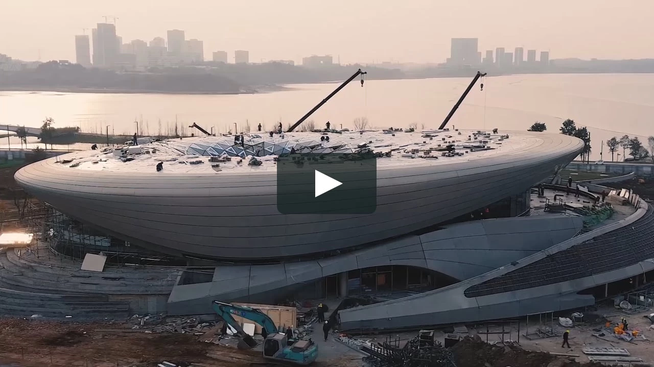 The Start-Up exhibition and conference centre, the first building within Chengdu's 67-hectare Unicorn Island masterplan in the Tianfu New Area, is nearing completion.